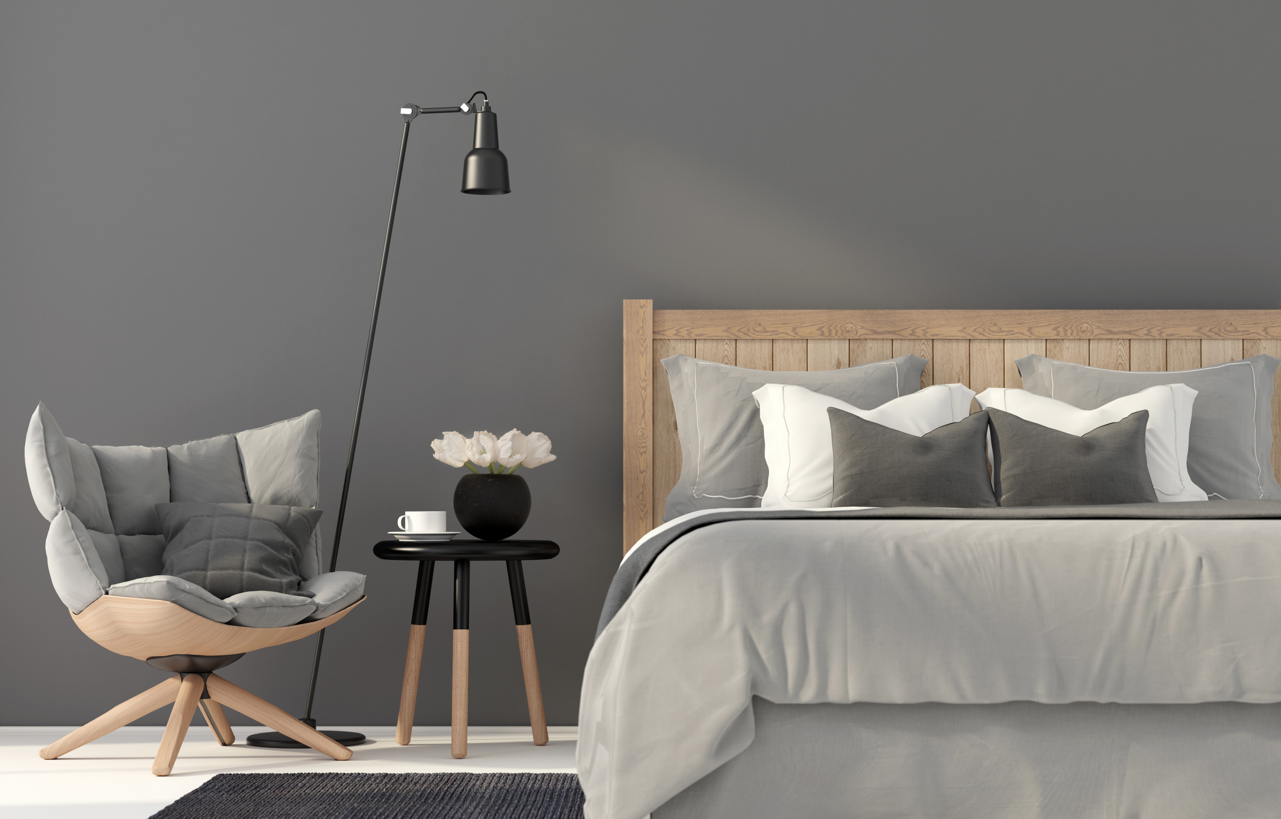 AElva_Graue_Wand_mit_Bett